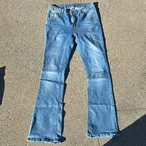 Blue Flare Wide Leg Jeans with Distressing and Frayed Hem